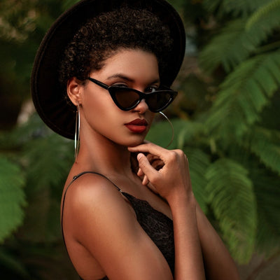 Image of a woman wearing sunglasses
